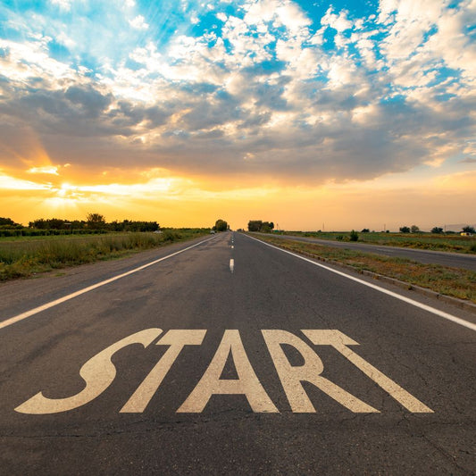Road ahead with start sign.