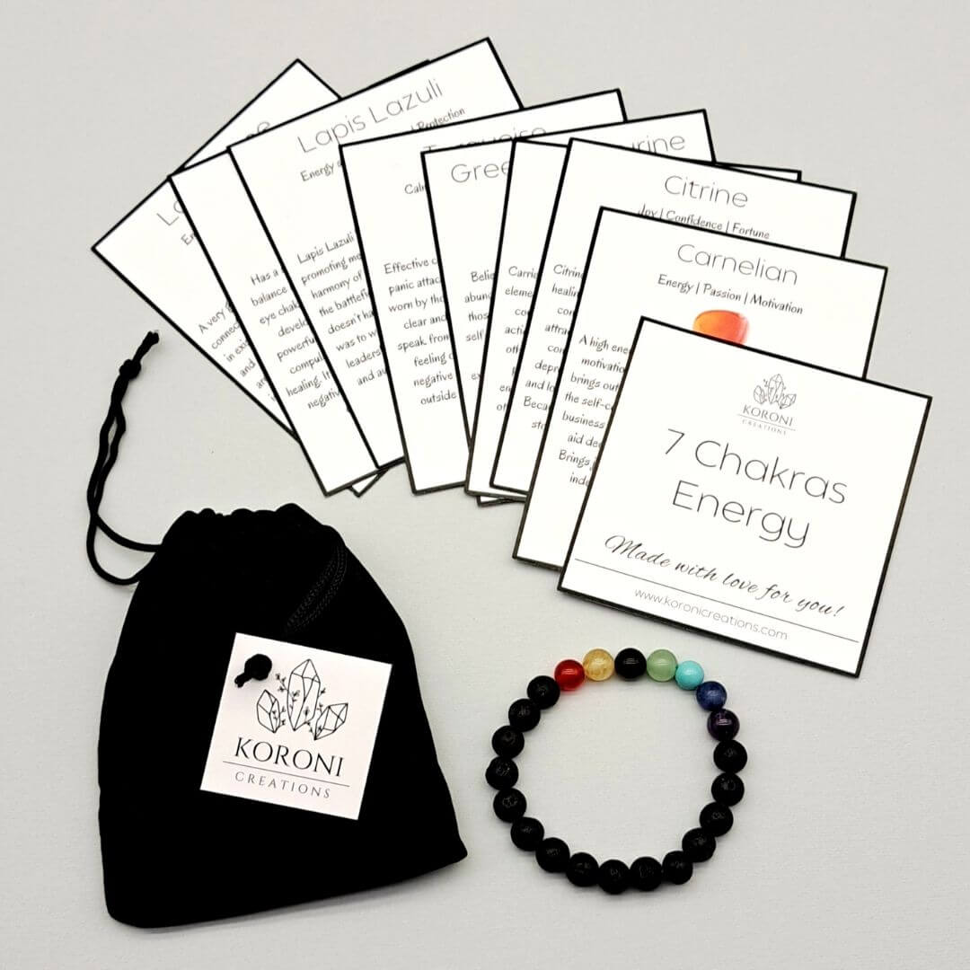 7 Chakra bracelet with crystal explanation cards and black velvet bag.