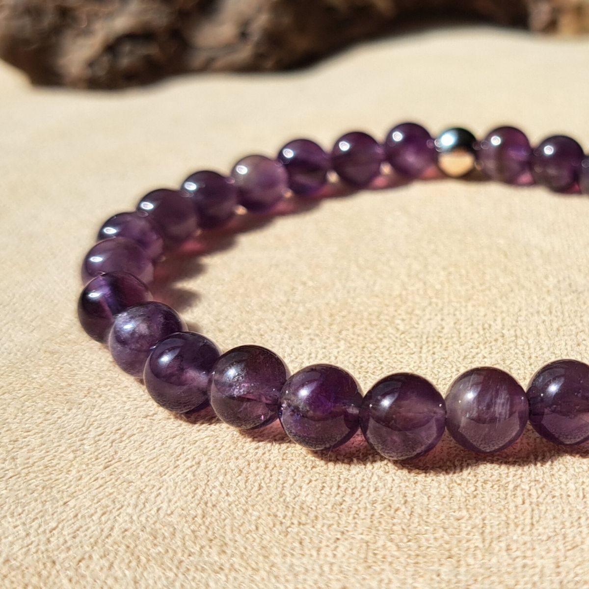 Amethyst crystal bracelet close-up.