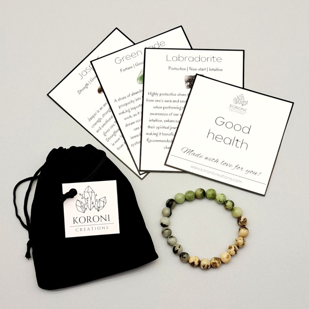 Good Health bracelet with crystal explanation cards and black velvet bag.