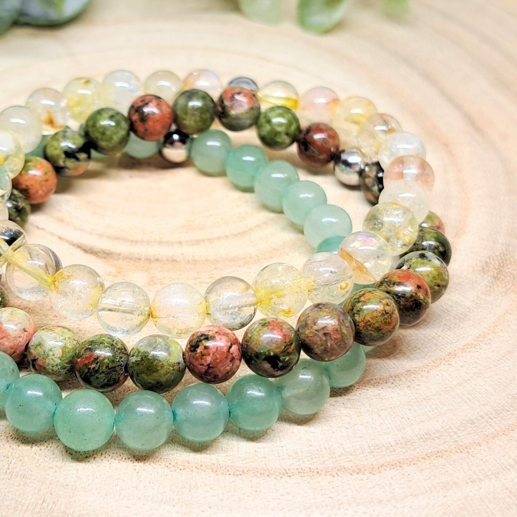 Green and yellow stone bracelets close look.