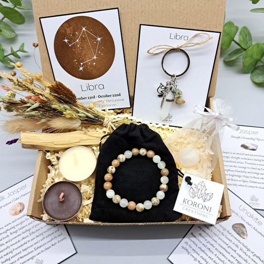 Libra birthday gift box, containing crystal bracelet, keychain, flowers, candles and other gift elements. Front look.