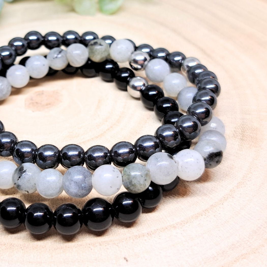 Gray and black bead bracelets close look.