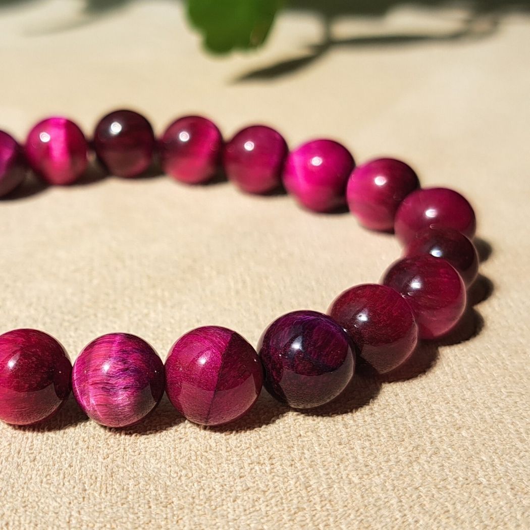 Pink Tiger Eye bracelet close-up.