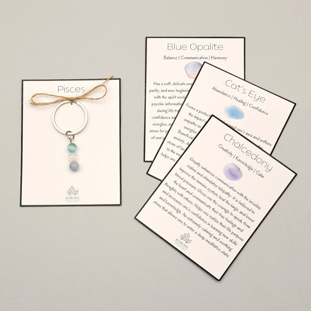 Pisces keychain made from crystals, explanation cards