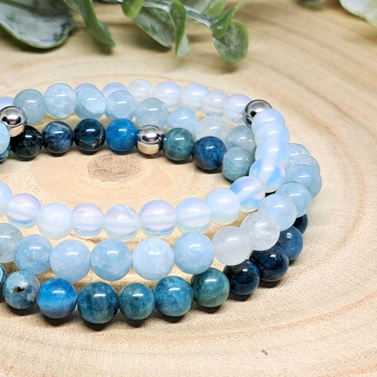 Light blue bead bracelets close look.